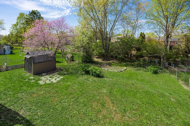 5930 Parkglen Rd, Galloway, OH 43119 - view of yard featuring fence, an outbuilding, and a shed