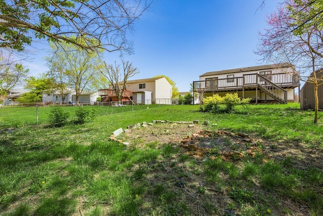 5930 Parkglen Rd, Galloway, OH 43119 - view of yard with fence, a wooden deck, and stairs