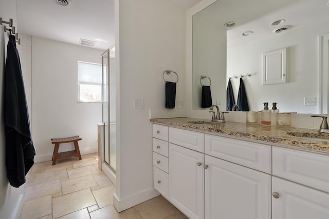 1345 Haines Ave, Columbus, OH 43212 - bathroom with a stall shower, baseboards, and vanity