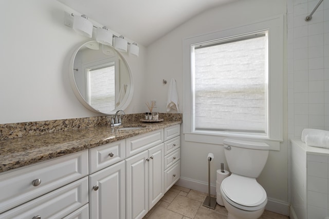 1345 Haines Ave, Columbus, OH 43212 - bathroom featuring lofted ceiling, toilet, vanity, baseboards, and a shower