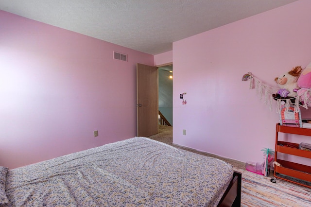 bedroom with visible vents