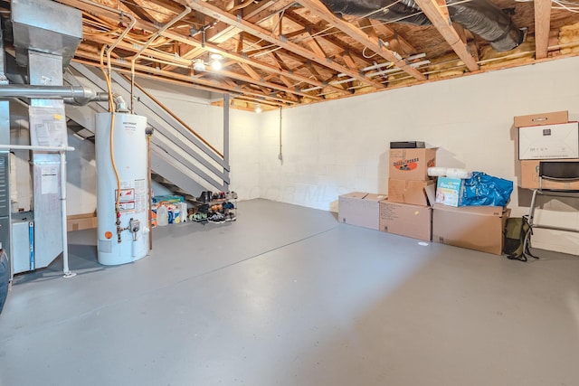 730 Erin St, Lewis Center, OH 43035 - unfinished basement featuring water heater, concrete block wall, and stairs