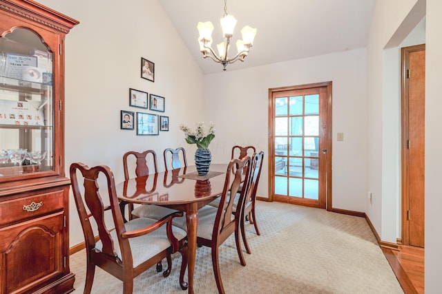 730 Erin St, Lewis Center, OH 43035 - dining area featuring an inviting chandelier, baseboards, light carpet, and lofted ceiling