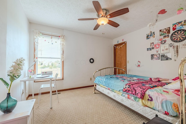 730 Erin St, Lewis Center, OH 43035 - bedroom with baseboards, light carpet, a ceiling fan, and a textured ceiling