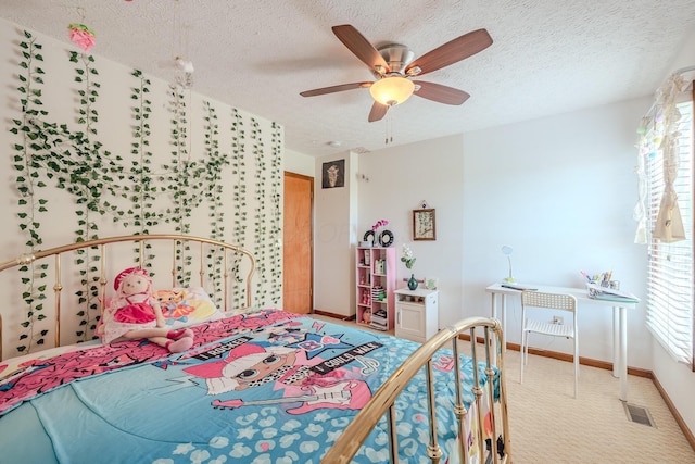 730 Erin St, Lewis Center, OH 43035 - bedroom with visible vents, baseboards, light colored carpet, a textured ceiling, and a ceiling fan