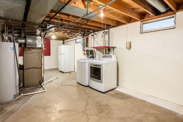 laundry room featuring electric panel, water heater, independent washer and dryer, and laundry area