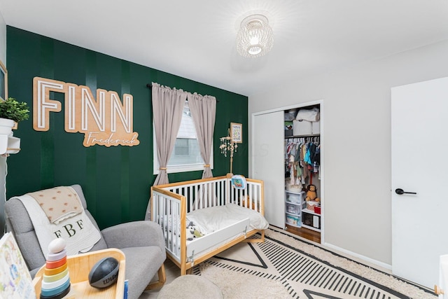 1898 Fenton St, Columbus, OH 43224 - bedroom featuring a nursery area, a closet, and baseboards