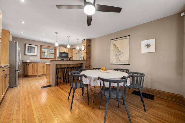 1397 Glenn Ave, Columbus, OH 43212 - dining room featuring light wood-type flooring, ceiling fan, and recessed lighting