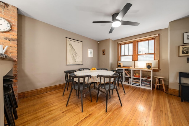 1397 Glenn Ave, Columbus, OH 43212 - dining space featuring light wood-style flooring, a ceiling fan, and baseboards
