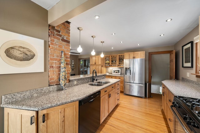 1397 Glenn Ave, Columbus, OH 43212 - kitchen featuring black appliances, a sink, light wood finished floors, light brown cabinetry, and glass insert cabinets