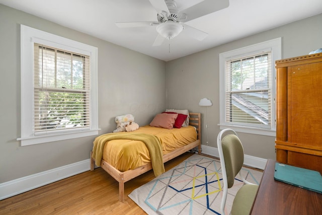 1397 Glenn Ave, Columbus, OH 43212 - bedroom with light wood-style floors, baseboards, and a ceiling fan
