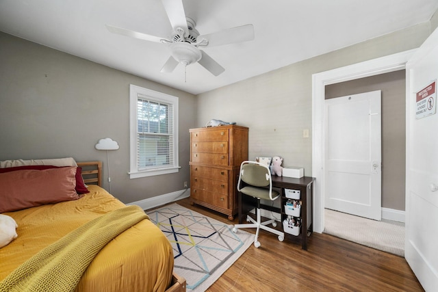 1397 Glenn Ave, Columbus, OH 43212 - bedroom with wood finished floors, baseboards, and a ceiling fan