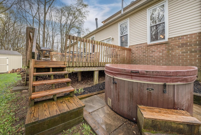 6181 Perry Rd, Centerburg, OH 43011 - deck featuring an outdoor structure, a shed, and a hot tub
