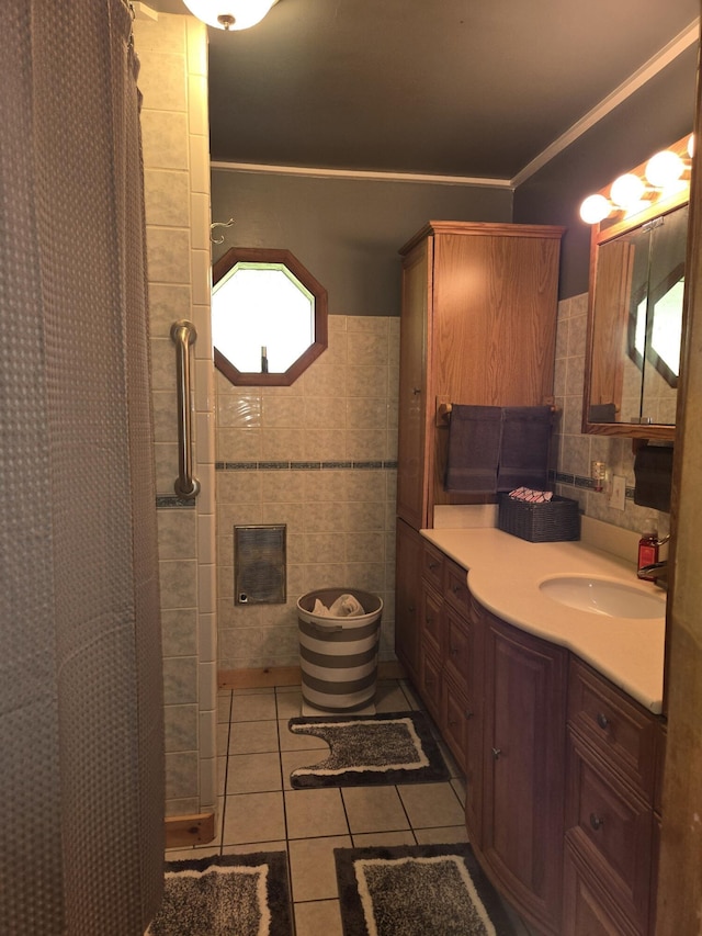 full bath with tile walls, vanity, curtained shower, crown molding, and tile patterned flooring
