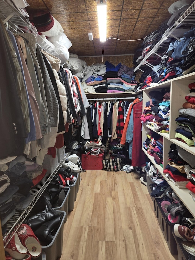 spacious closet featuring wood finished floors