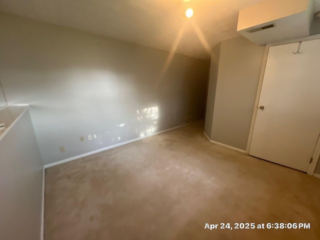 bonus room with visible vents, baseboards, and carpet floors