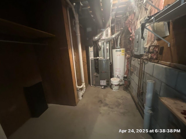 utilities featuring electric panel and gas water heater