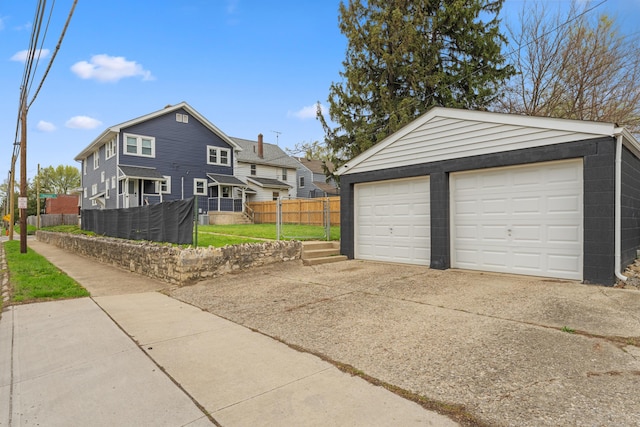 1284-1286 S Champion Ave, Columbus, OH 43206 - detached garage featuring a residential view and fence