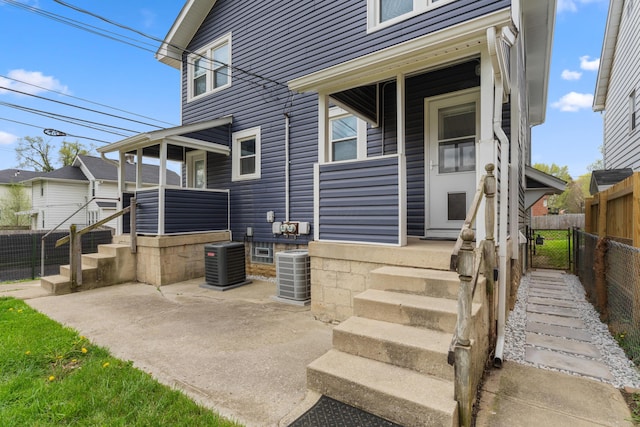 1284-1286 S Champion Ave, Columbus, OH 43206 - exterior space featuring fence and central AC unit