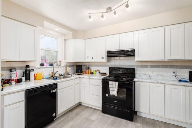 1284-1286 S Champion Ave, Columbus, OH 43206 - kitchen featuring black appliances, a sink, white cabinets, and under cabinet range hood