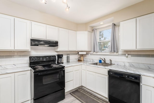 1284-1286 S Champion Ave, Columbus, OH 43206 - kitchen with black appliances, a sink, white cabinetry, and under cabinet range hood