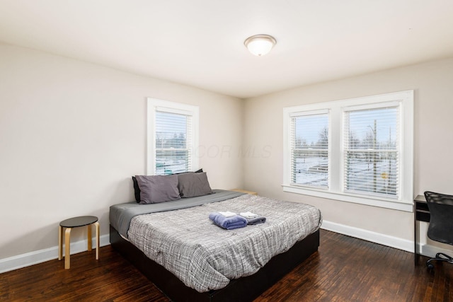 1284-1286 S Champion Ave, Columbus, OH 43206 - bedroom with dark wood-style floors and baseboards