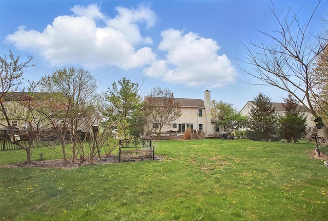 view of yard featuring fence