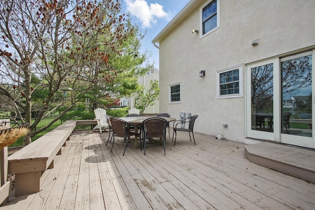 deck with outdoor dining space