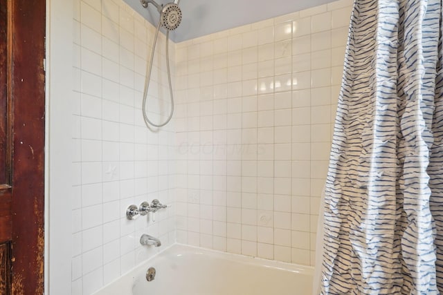 full bath with shower / bath combination with curtain