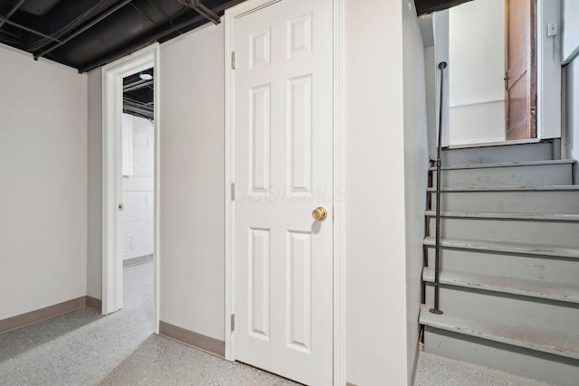 staircase with baseboards