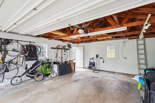 garage featuring a garage door opener