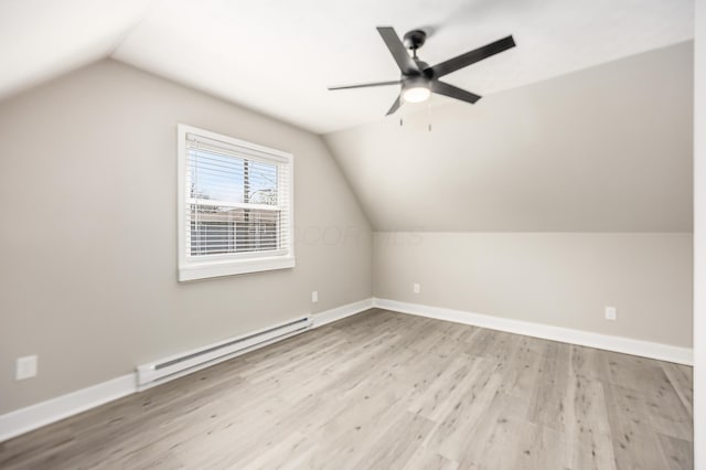 116 W S Ave, Plain City, OH 43064 - additional living space with lofted ceiling, a ceiling fan, baseboards, wood finished floors, and a baseboard radiator