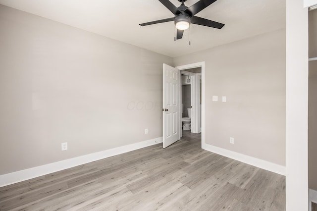116 W S Ave, Plain City, OH 43064 - unfurnished bedroom with a ceiling fan, light wood-style flooring, and baseboards