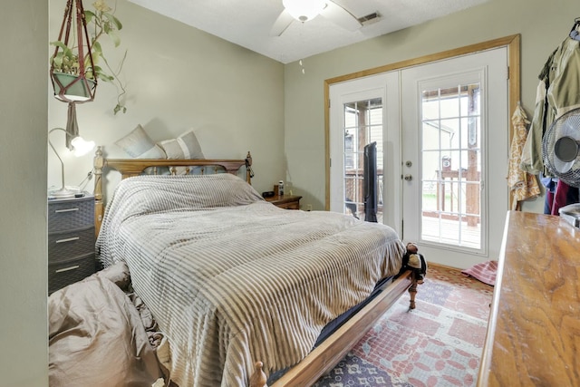 bedroom featuring french doors, visible vents, access to outside, and multiple windows