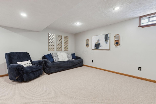 81 Highmeadows Cir, Powell, OH 43065 - living area with a textured ceiling, recessed lighting, carpet flooring, and baseboards