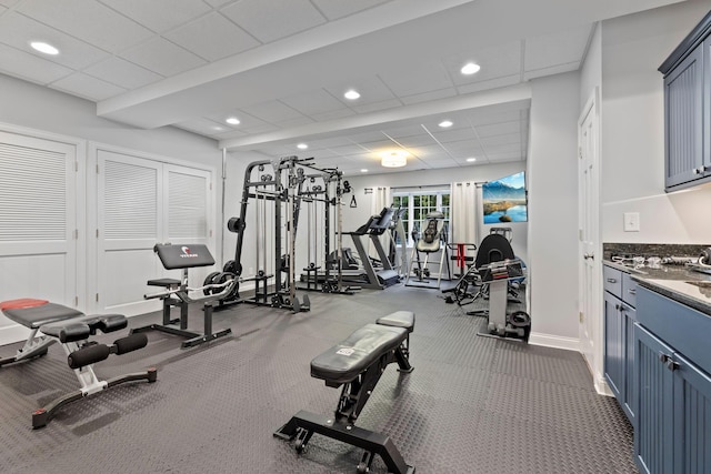 660 Woods Hollow Ln, Powell, OH 43065 - workout area with recessed lighting, a paneled ceiling, and baseboards