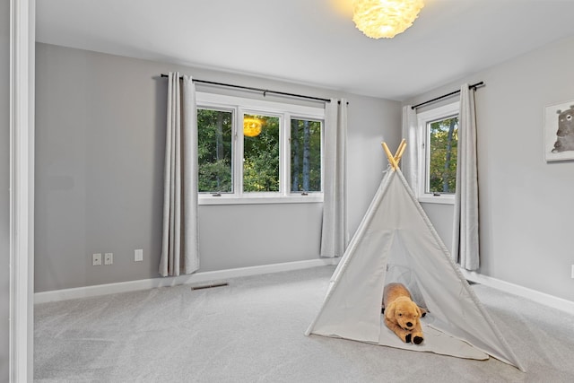 660 Woods Hollow Ln, Powell, OH 43065 - rec room featuring carpet flooring and baseboards