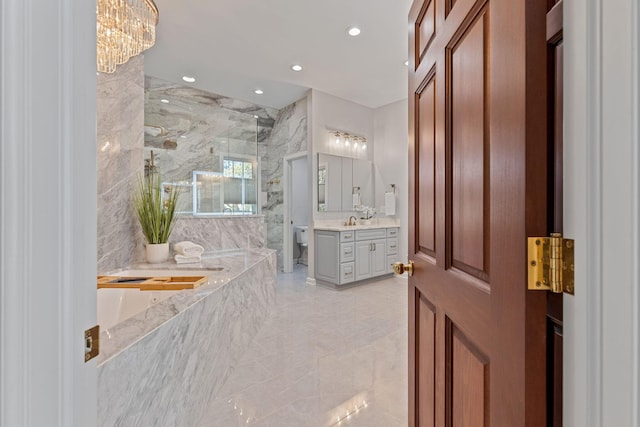 660 Woods Hollow Ln, Powell, OH 43065 - full bathroom with recessed lighting, toilet, a bath, vanity, and a marble finish shower