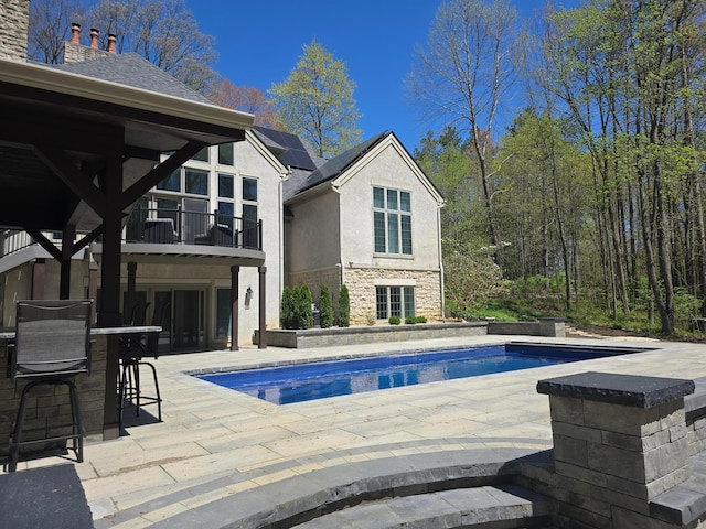 660 Woods Hollow Ln, Powell, OH 43065 - pool with outdoor dry bar and a patio area
