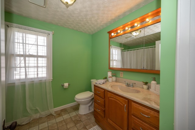 264 Merchant Ave, Marion, OH 43302 - bathroom featuring baseboards, vanity, toilet, and a shower with shower curtain