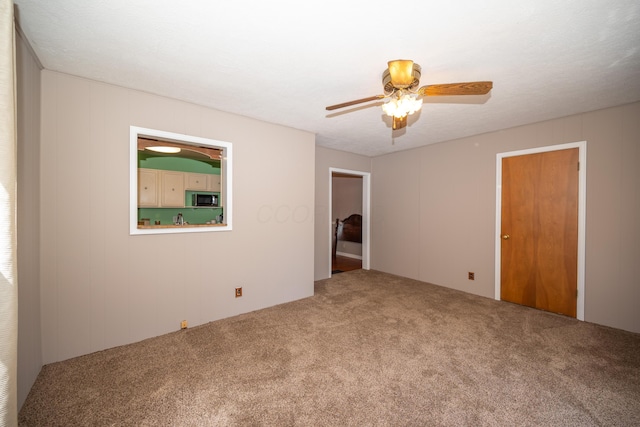 264 Merchant Ave, Marion, OH 43302 - carpeted spare room with ceiling fan