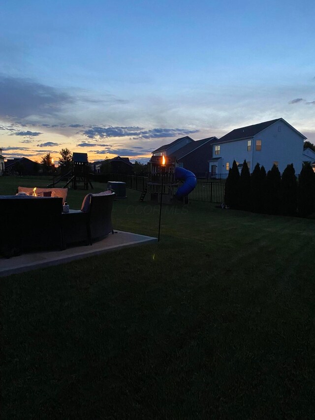 4322 Bobwhite, Powell, OH 43065 - yard at dusk featuring an outdoor fire pit