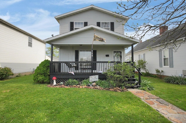 view of front of house featuring a porch and a front lawn