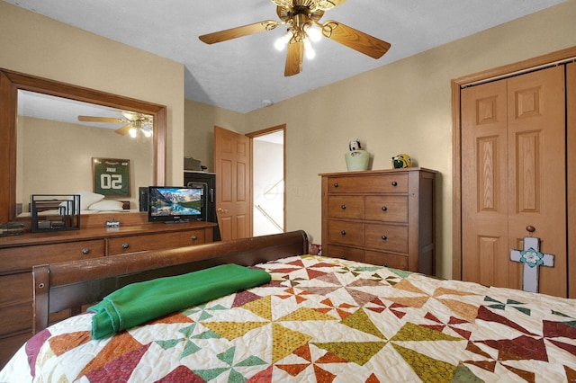 bedroom featuring a closet and ceiling fan