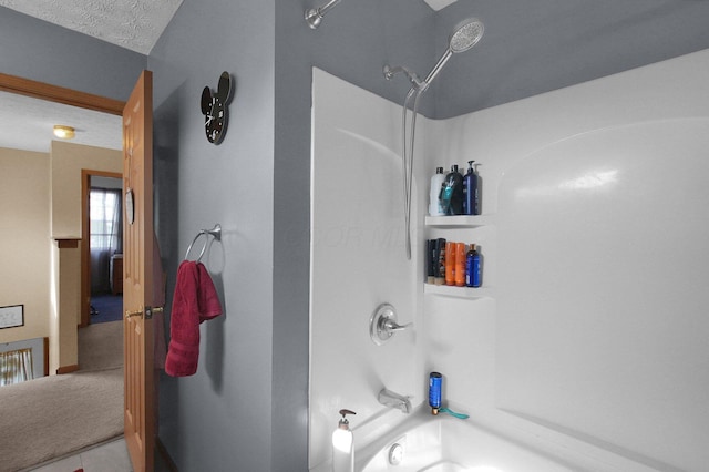 full bath with tile patterned flooring and bathtub / shower combination