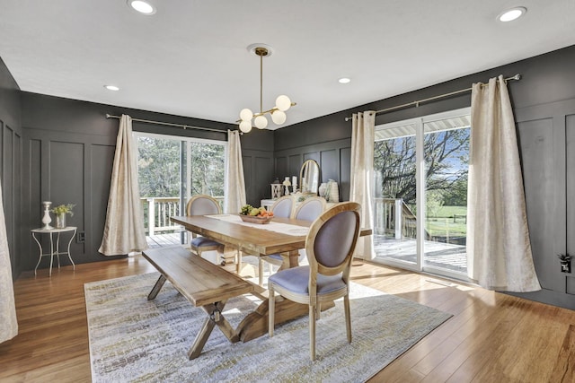 6495 Julian Rd SW, Amanda, OH 43102 - dining room with wood finished floors, recessed lighting, a decorative wall, and a chandelier