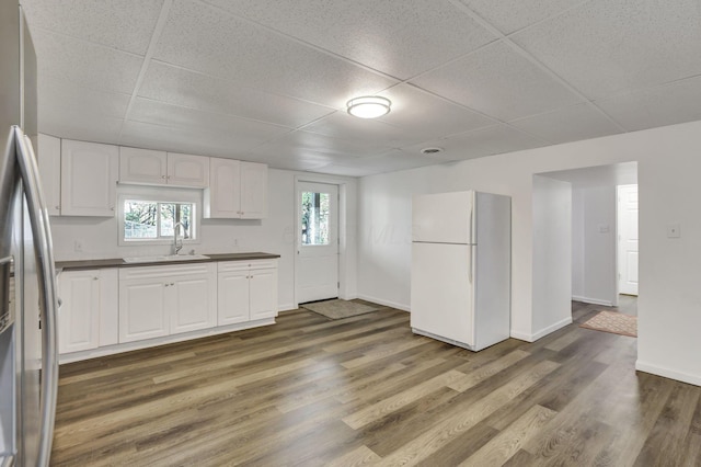 6495 Julian Rd SW, Amanda, OH 43102 - kitchen with white cabinets, freestanding refrigerator, and a drop ceiling