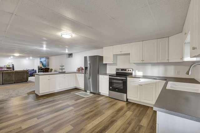 6495 Julian Rd SW, Amanda, OH 43102 - kitchen with a sink, appliances with stainless steel finishes, a drop ceiling, and dark countertops