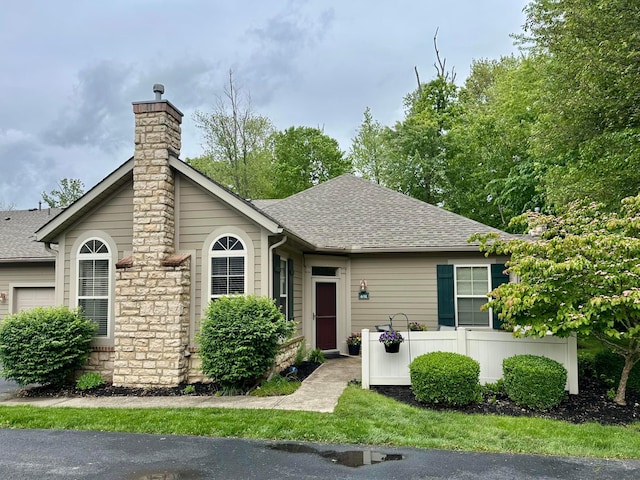 651 Albion Pl, Westerville, OH 43082 - ranch-style house with a chimney and a shingled roof