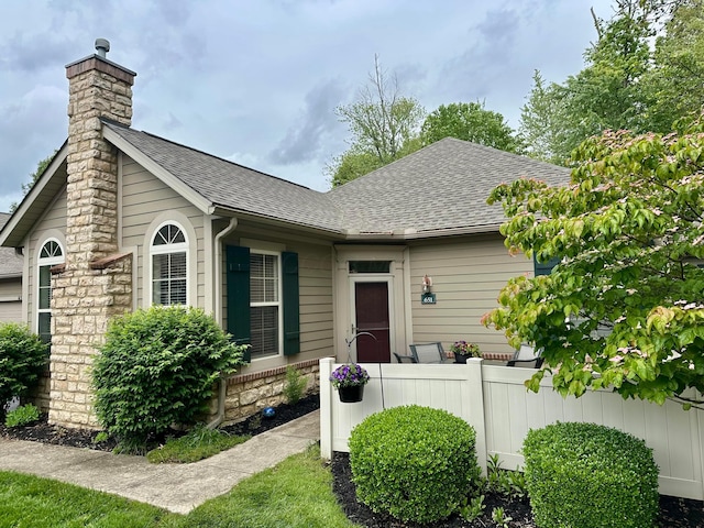 651 Albion Pl, Westerville, OH 43082 - view of front of property with roof with shingles and a chimney